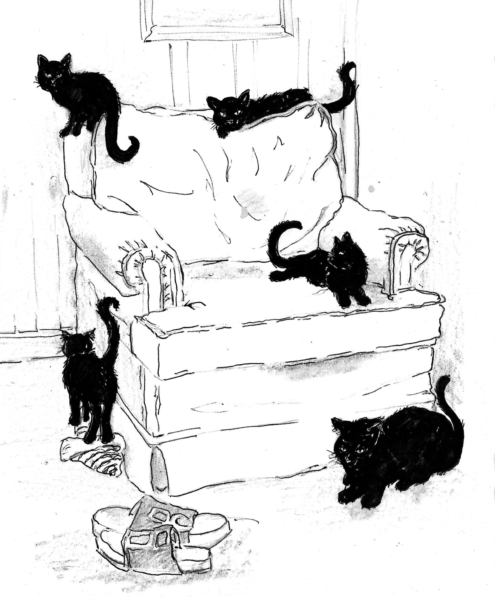 Cats Lounging Around A Chair